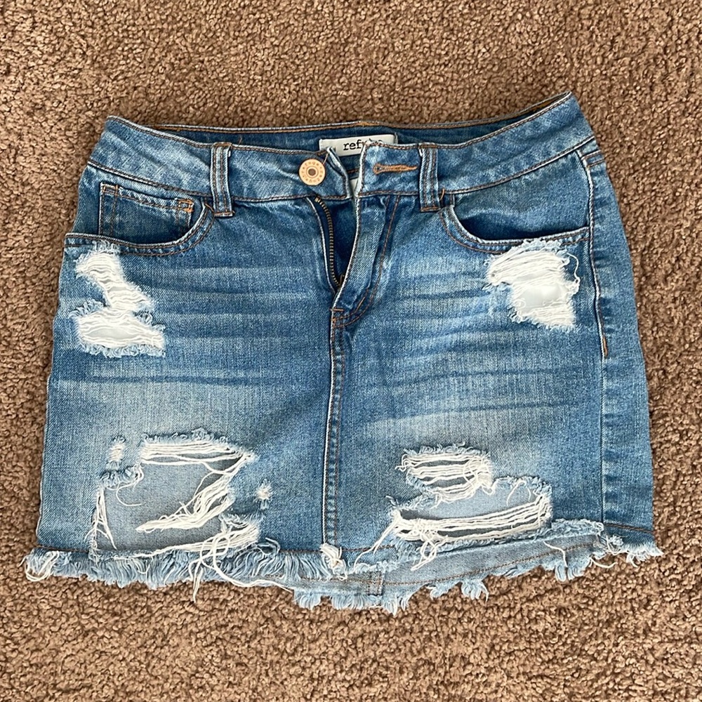 Ripped denim skirt
